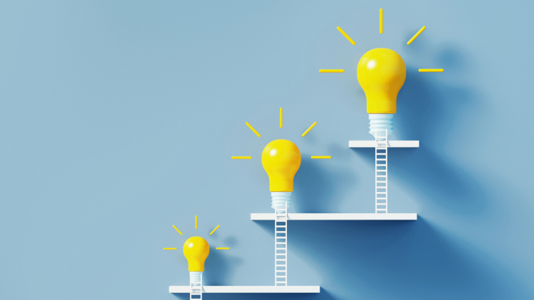 Ladders leading to lightbulbs